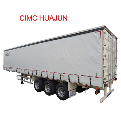 CIMC HUAJUN トレーラーカーテンストレッサー 3軸 40 フィートドロップデッキ 乾燥貨物輸送